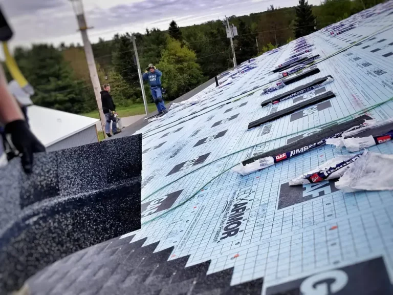 Superior Roofing crew installing roofing underlayment